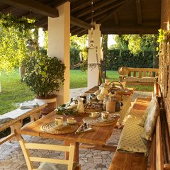 Breakfast underneath the porch at casa Volton in Lignano